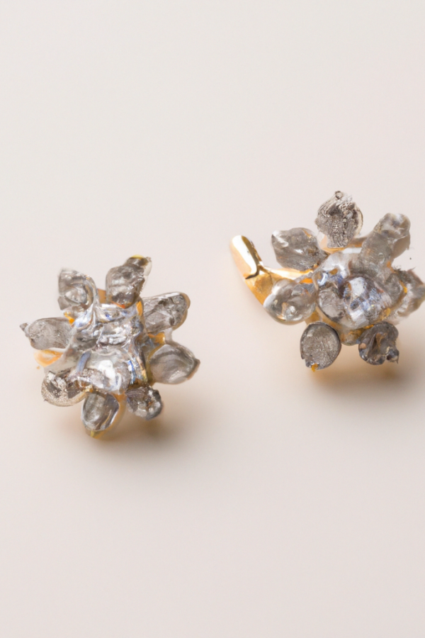 DALL·E 2024-01-12 12.05.54 - product category picture of luxury gold and diamond earrings on light colored background